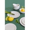 Комплект от 12 части от бели порцеланови чинии Purita - Bonami Essentials