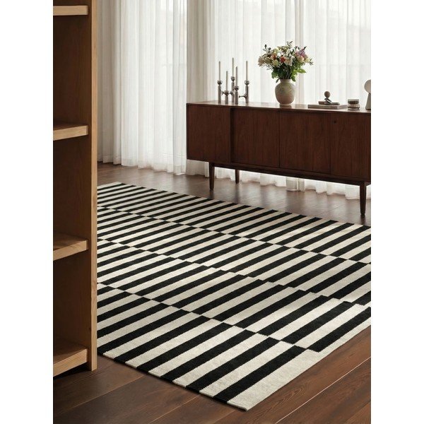 Черно-бял двустранен ръчно изработен вълнен килим 200x300 cm Donna – Hanse Home-image-1