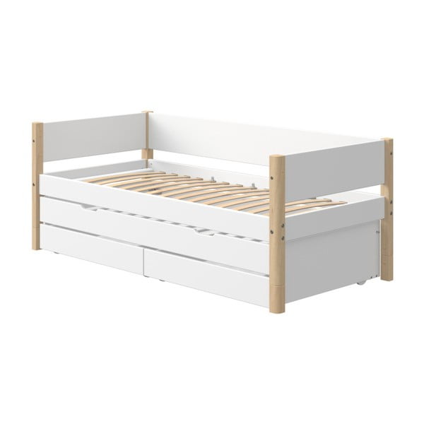 Bílá dětská postel s přídavným výsuvným lůžkem a úložným prostorem a nohami z březového dřeva Flexa White