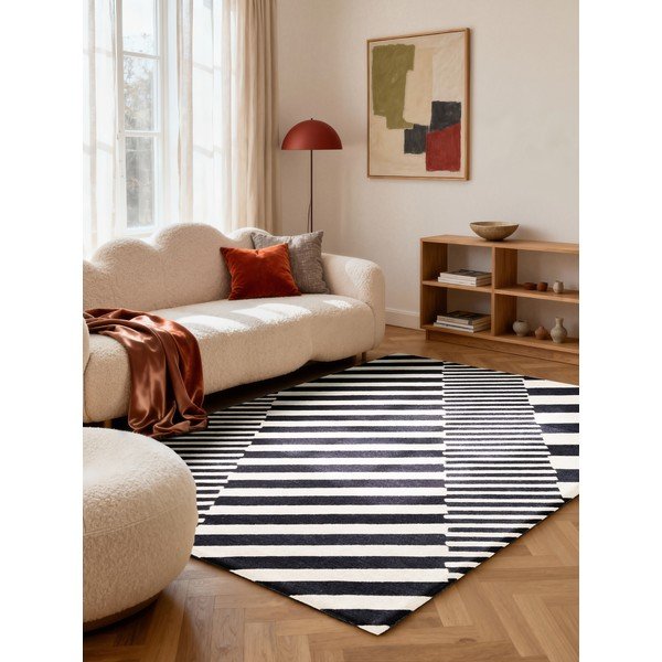 Черно-бял ръчно изработен вълнен килим 160x230 cm Stryve Flux – Elle Decoration-image-1