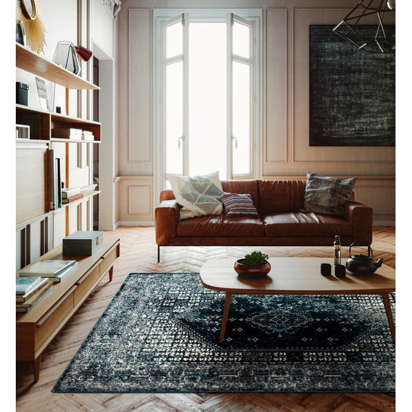 Вълнен килим в бензинов цвят 133x180 cm Eve - Agnella-image-1