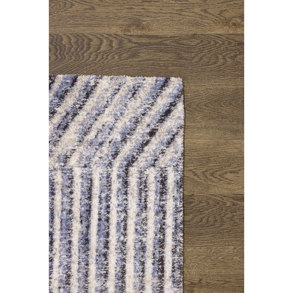 Светлосин вълнен килим 133x180 cm Strokes - Agnella-image-3