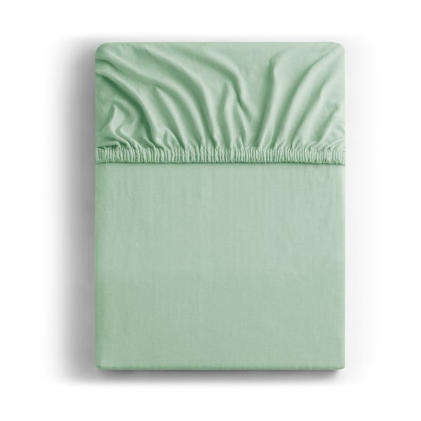 Светлозелен еластичен чаршаф от джърси 240x220 cm Amber – DecoKing