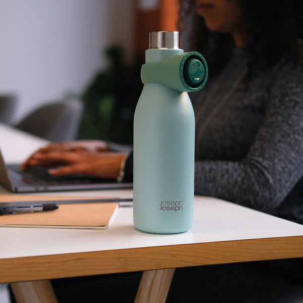 Пътническа бутилка от неръждаема стомана в цвят мента 500 мл Loop - Joseph Joseph-image-1