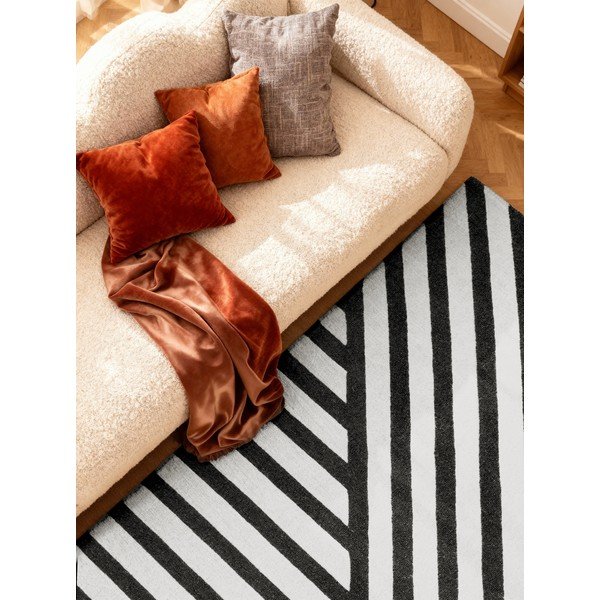 Черно-бял ръчно изработен вълнен килим 120x180 cm Stryve Noir – Elle Decoration-image-2