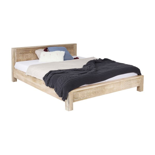 Ručně vyřezávaná postel z mangového dřeva Kare Design Puro, 160 x 200 cm